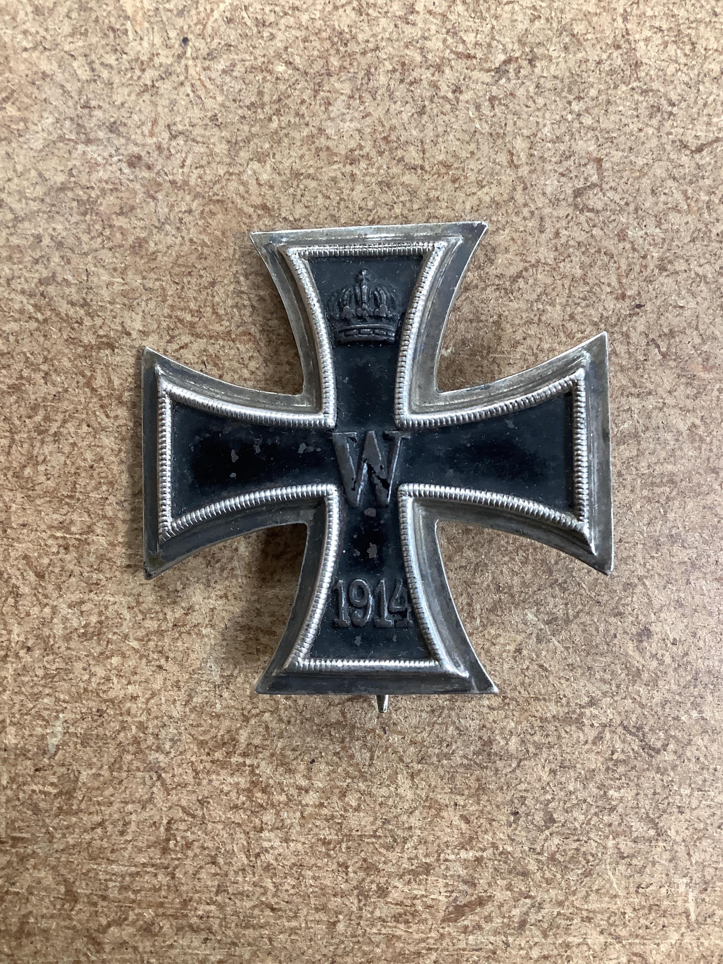Four First World War German medals; a First Class Iron Cross, a 2nd Class Iron Cross, a 1914-1918 Honour Cross and an Austro-Hungarian Medal for Bravery, together with a wound badge and the related stick pin for the meda